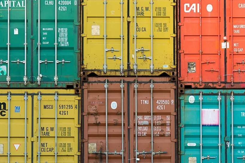 Loaded freight containers sealed by tamper evident security seals.